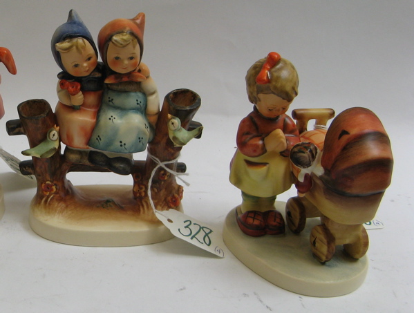 Appraisal: FOUR GERMAN HUMMEL FIGURES Coquettes HUM H TM- Doll Mother