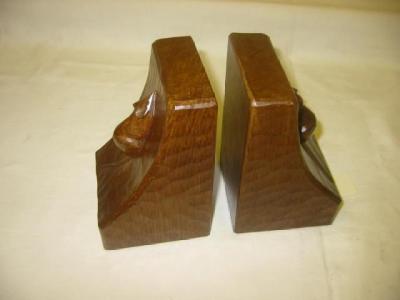 Appraisal: A PAIR OF ADZED OAK BOOKENDS by Robert Mouseman Thompson