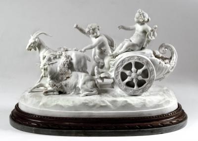 Appraisal: A SEVRES WHITE BISCUIT PORCELAIN GROUP depicting two putti with