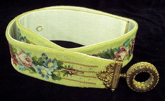 Appraisal: A needlework bell pull with gilt metal mounts