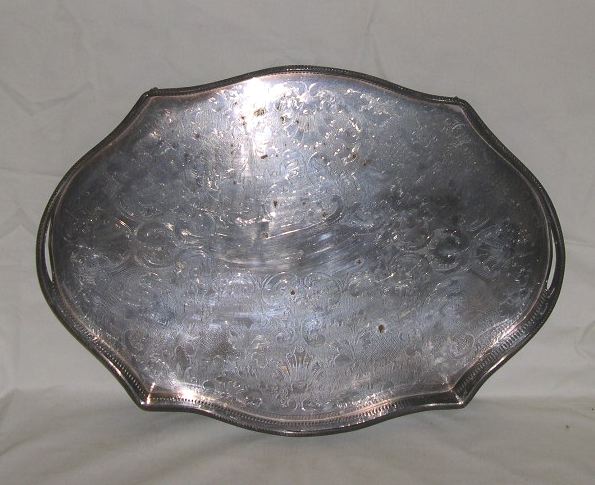 Appraisal: Good Sheffield-Plate Two-Handled Serpentine Waiter early th century the sides