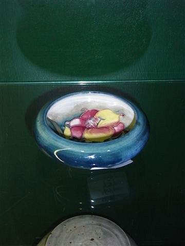 Appraisal: A MOORCROFT 'FREESIA' PATTERN SMALL BOWL across