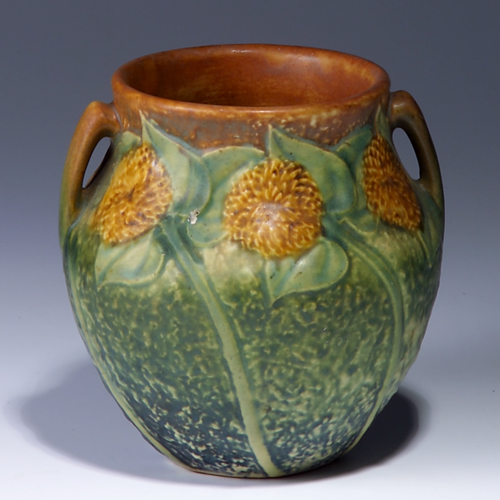 Appraisal: ROSEVILLE Sunflower bulbous two-handled vase Burst with nick to one