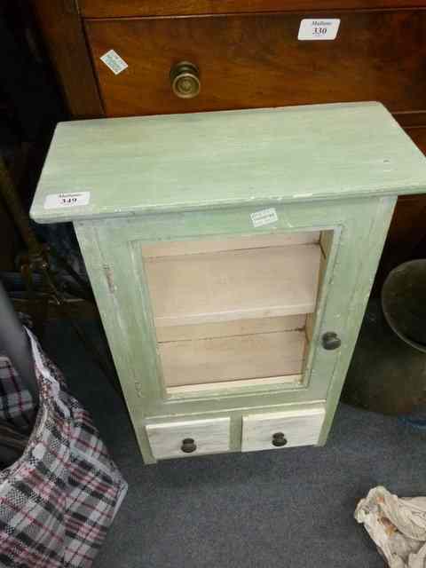 Appraisal: A SMALL PAINTED WALL CUPBOARD with single panelled door and