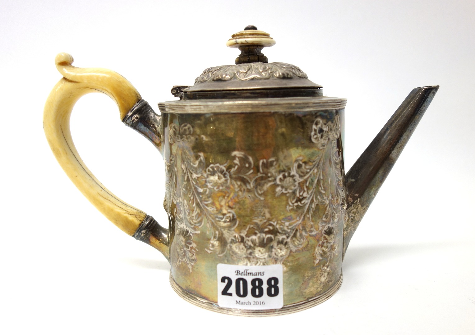 Appraisal: A George III silver teapot with later floral and foliate