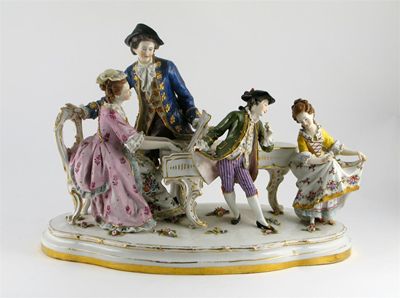 Appraisal: A large Continental porcelain Music group a seated lady playing