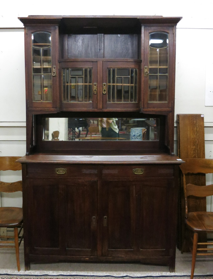 Appraisal: A TALL OAK SIDEBOARD Belgian early th century in two