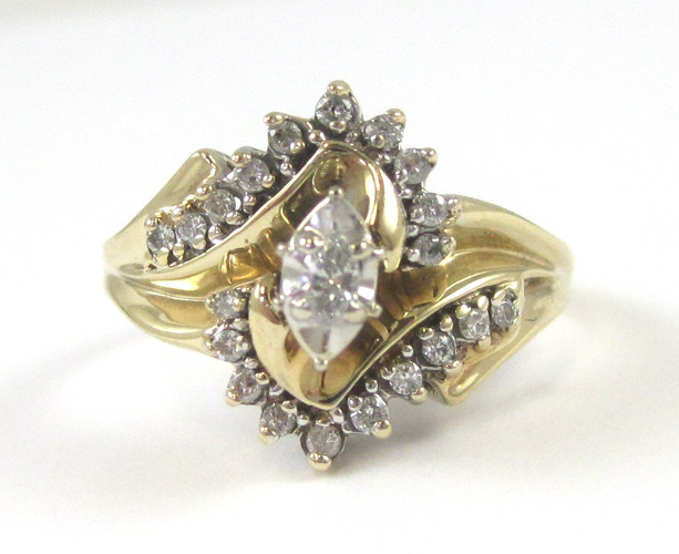 Appraisal: DIAMOND AND TEN KARAT GOLD RING with round-cut diamonds set