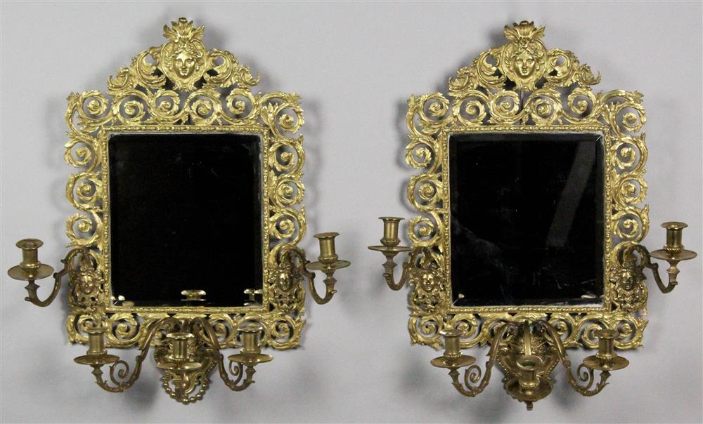 Appraisal: PAIR OF CLASSICAL CAST BRONZE FIVE CANDLE MIRRORED SCONCES late