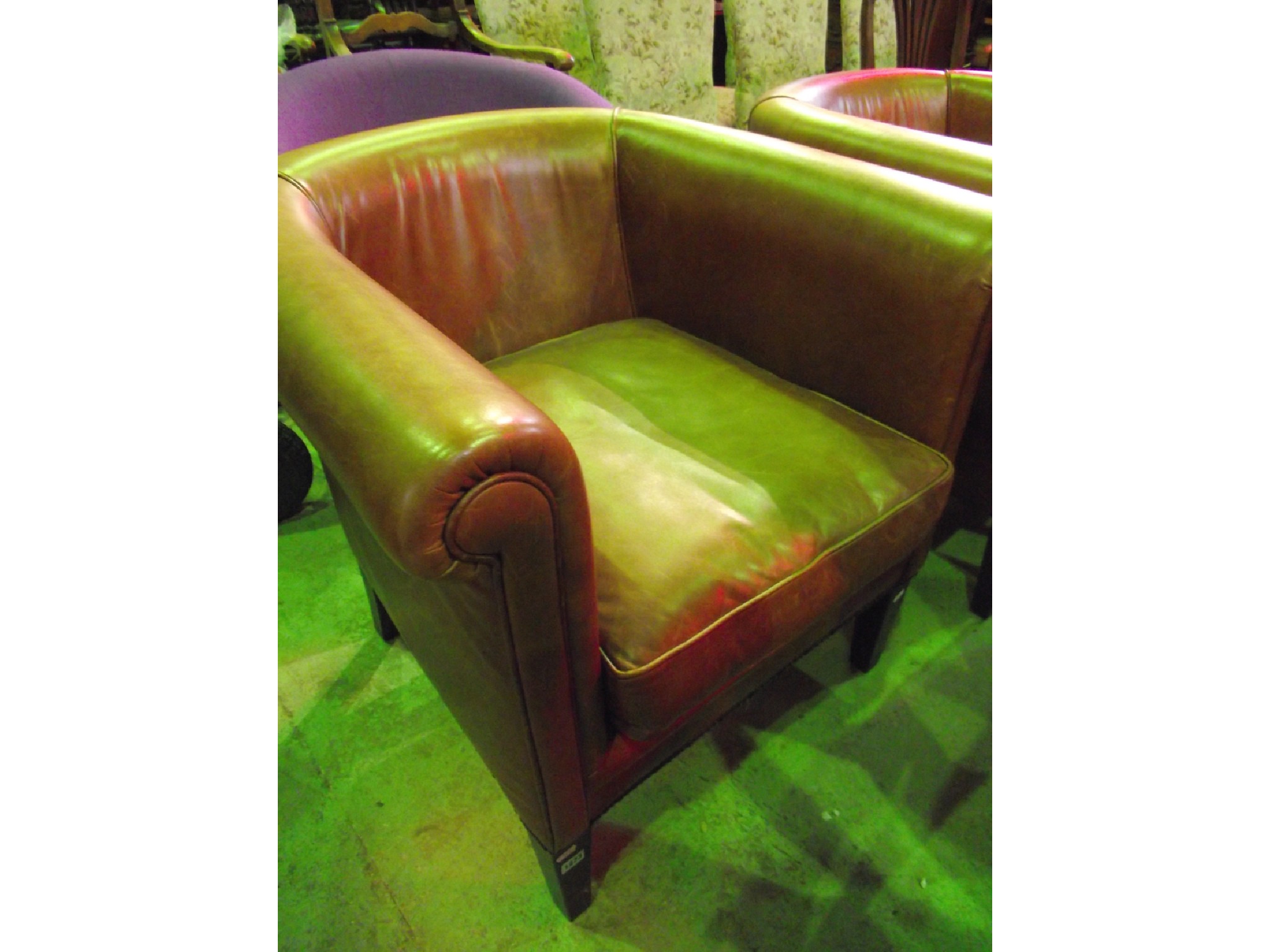 Appraisal: A pair of good quality contemporary tan leather upholstered tub