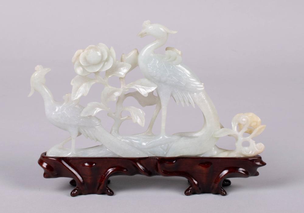 Appraisal: CHINESE JADEITE CARVING OF TWO PHOENIX AND FLOWERING PEONY the