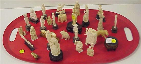 Appraisal: Miniature ivory and bone figures the largest h along with