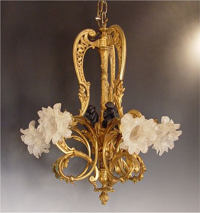 Appraisal: FRENCH DORE BRONZE CHANDELIER WITH BRONZE CHERUBS light with frosted