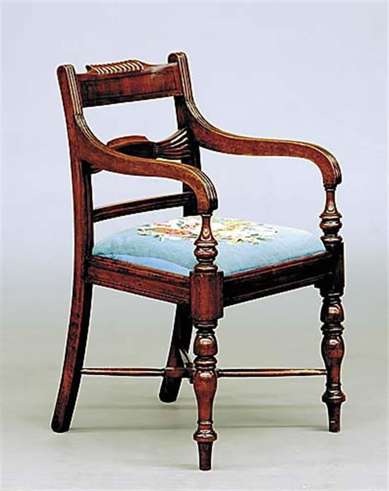 Appraisal: William IV carved mahogany armchair th centuryring-turned crest issuing downswept