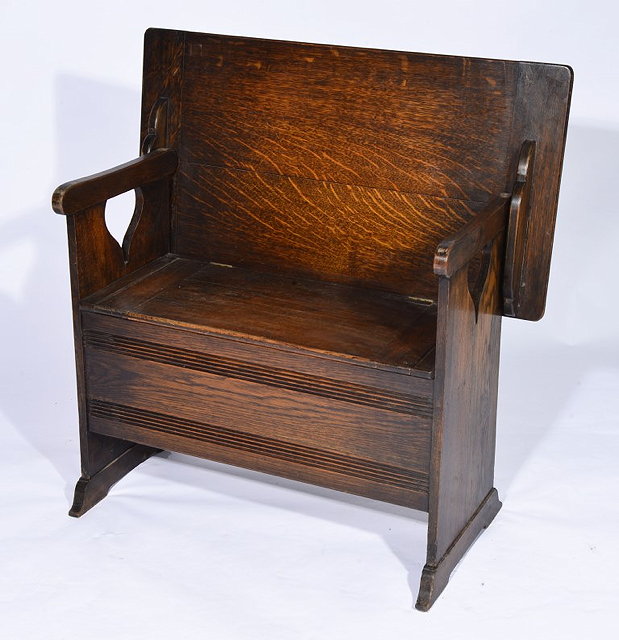 Appraisal: A LIBERTY CO OAK MONK'S BENCH with heart-shaped cut-outs to