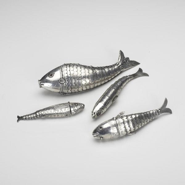 Appraisal: ARTICULATED SILVER FISH Four pieces th th C silver multi-compartment