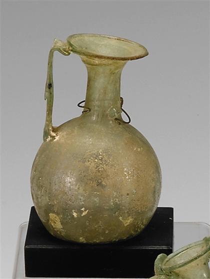 Appraisal: Roman glass bottle nd rd century ad The globular body