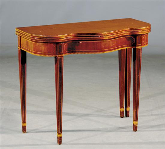 Appraisal: Hepplewhite inlaid mahogany game table hinged serpentine shaped top above