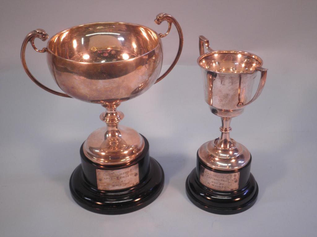 Appraisal: A silver two handled trophy on a knopped stem and