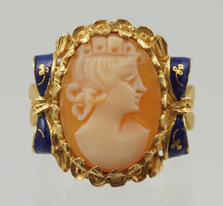 Appraisal: K YG carved shell cameo portrait ring black enamel detail