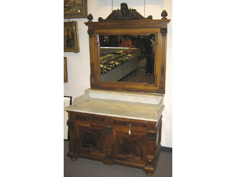 Appraisal: AUSTRIAN TH CENTURY MARBLE TOP DRESSER Showing a mirror on