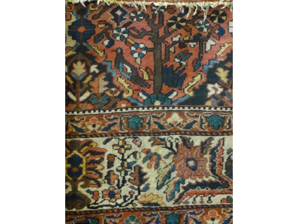 Appraisal: A large Mahal design Persian carpet with a central row