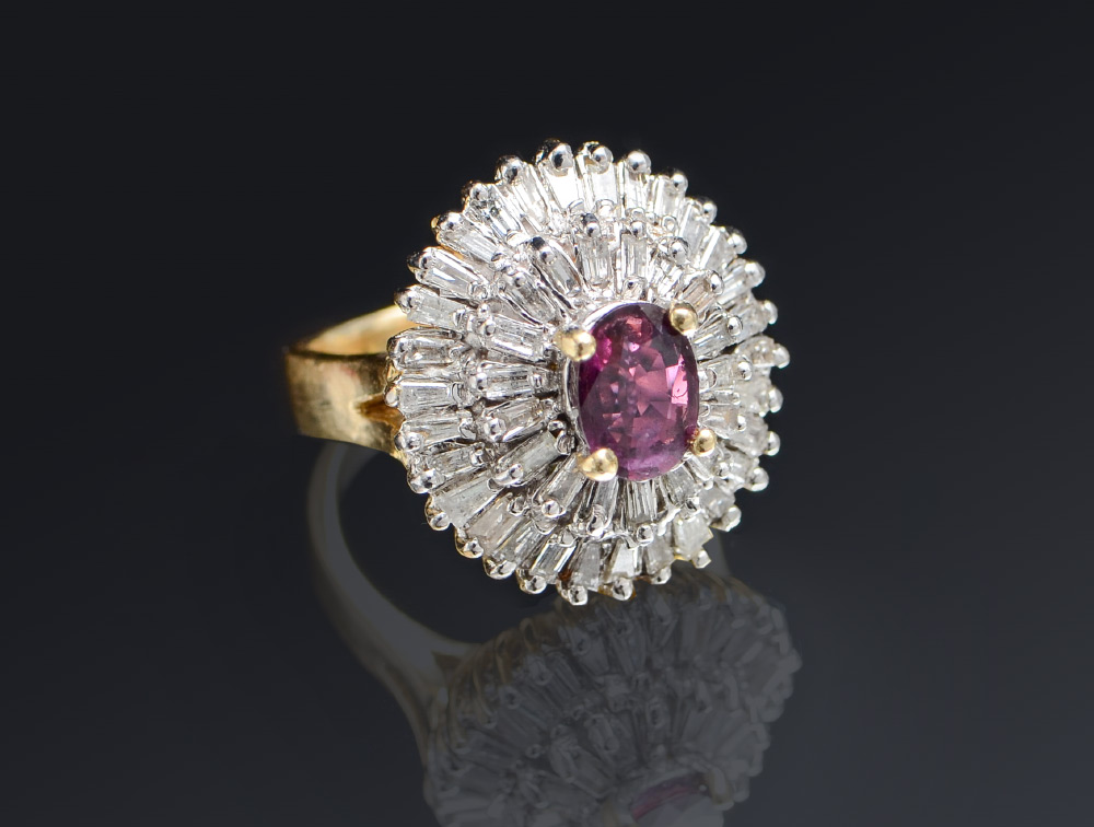 Appraisal: RUBY AND DIAMOND RING K yellow gold ring centering a