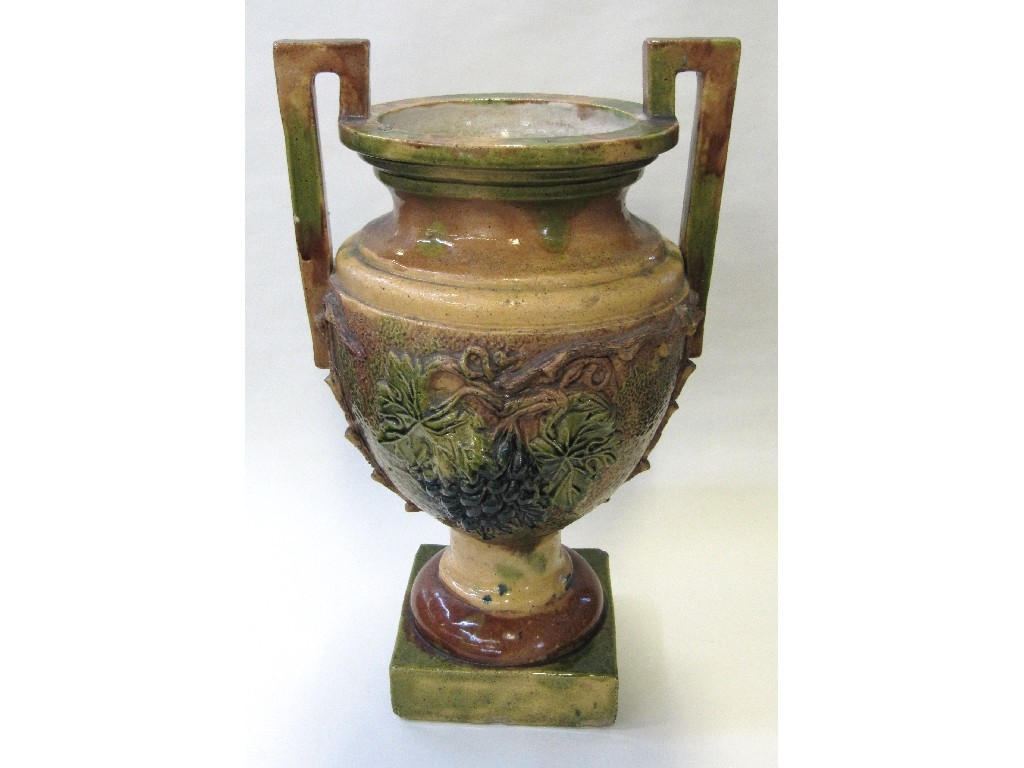 Appraisal: Stoneware pottery two handled urn decorated with grapes and vines