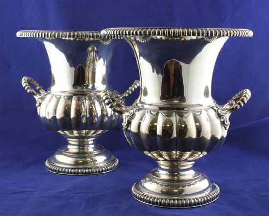 Appraisal: A pair of th century Sheffield plate campana shaped wine