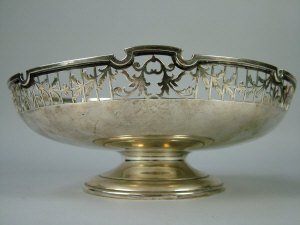 Appraisal: A George V silver circular fruit bowl Sheffield with pierced