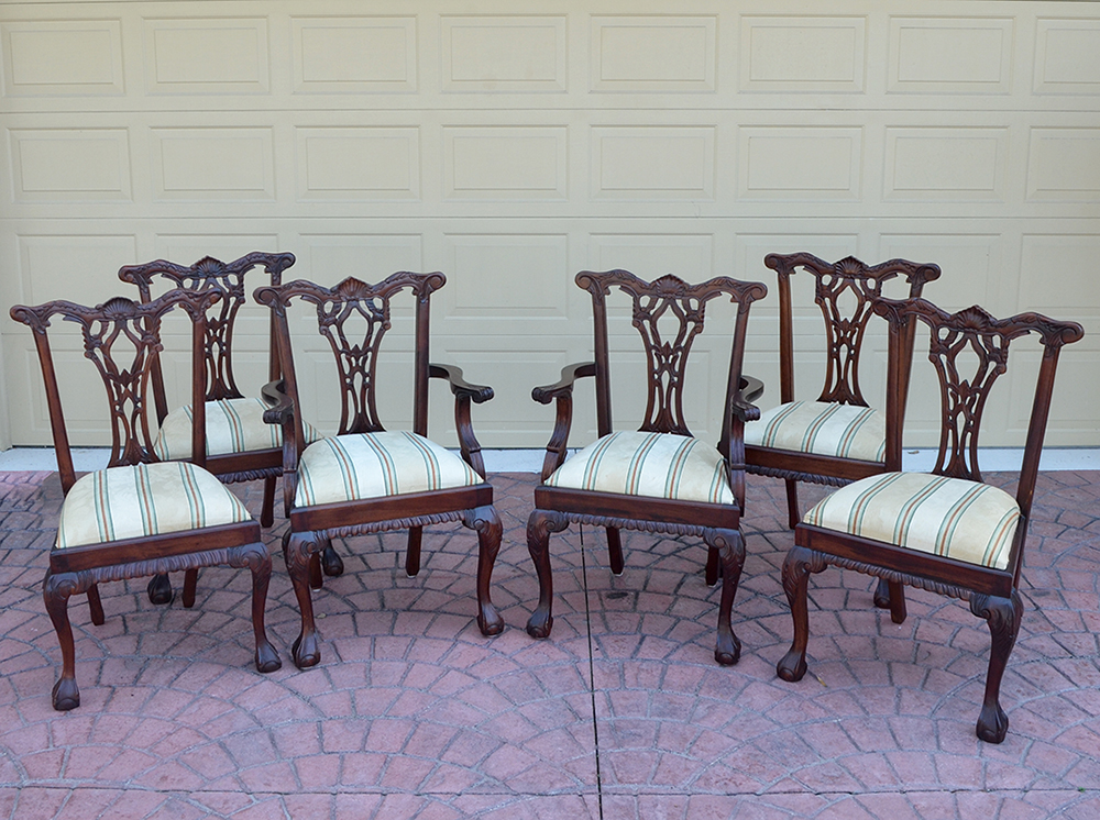 Appraisal: CARVED CHIPPENDALE STYLE CHAIRS Carved and shaped backs arms supports