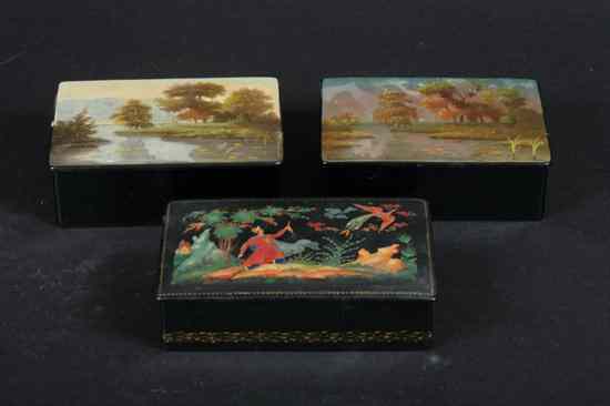 Appraisal: THREE RUSSIAN LACQUER BOXES One with fairytale decoration two with