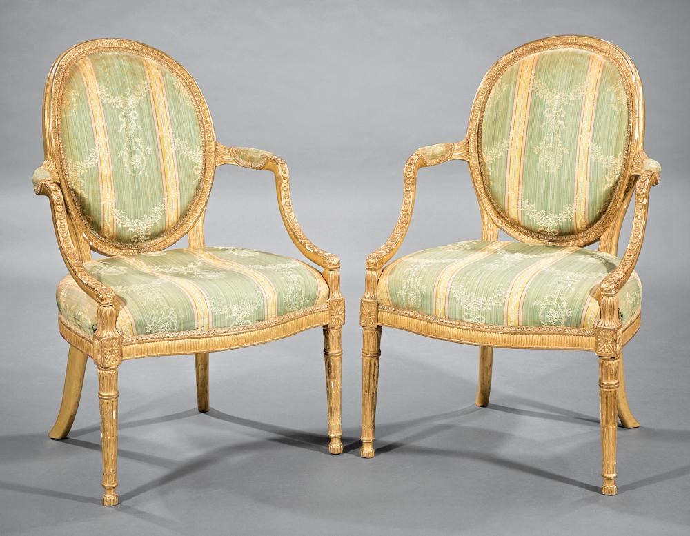 Appraisal: Pair Louis XVI-Style Giltwood Fauteuils oval back padded arms floral-blocked