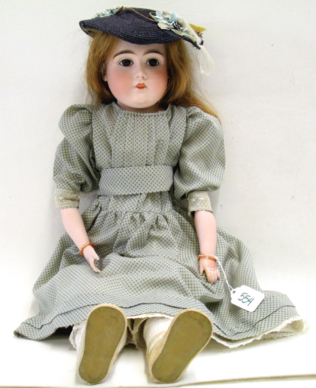 Appraisal: GERMAN BISQUE HEAD DOLL Kestner attributed having long brown wig