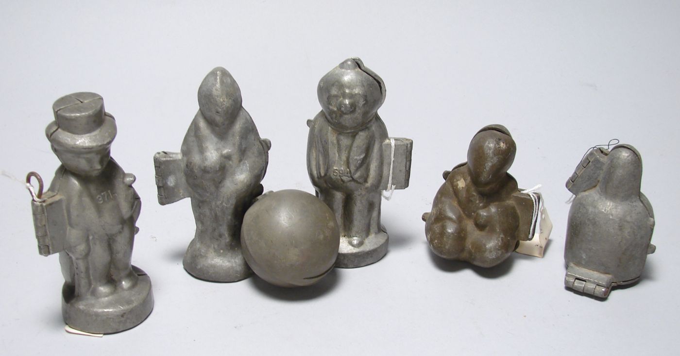 Appraisal: SIX VINTAGE PEWTER ICE CREAM MOLDS A ball a bowling