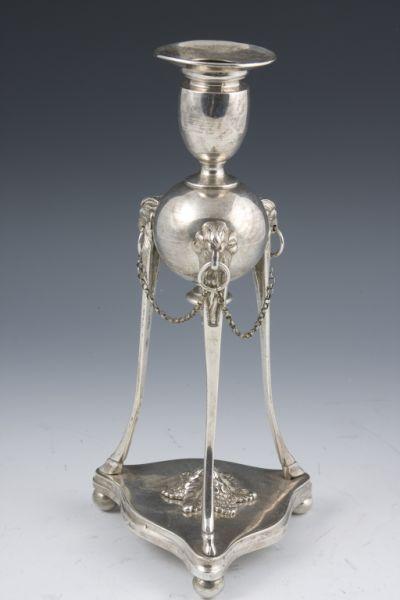 Appraisal: Neoclassical Style Silver Plate Candlestick having a nozzle raised atop