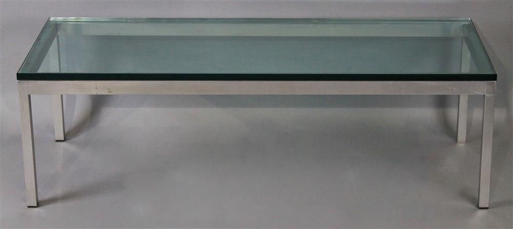 Appraisal: CHROME AND GLASS RECTANGULAR COFFEE TABLE in thick glass top