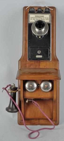 Appraisal: Western Electric Fiddleback with Coin Collector Description Circa Walnut Western