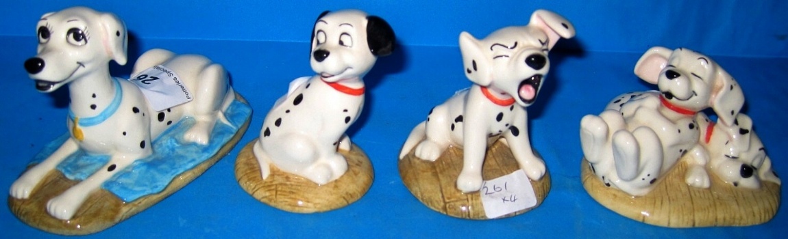 Appraisal: Royal Doulton Figures from Walt Disney Dalmatians Series Penny Freckles