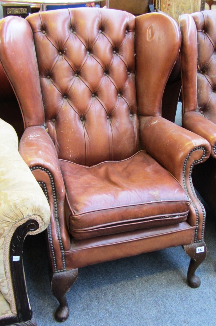 Appraisal: A pair of th century style faux brown leather wing