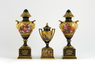 Appraisal: A pair of Vienna-style vases and covers and a similar