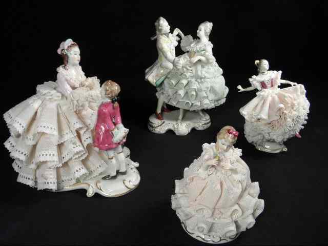 Appraisal: Lot of four Irish Dresden lace porcelain figural groups and