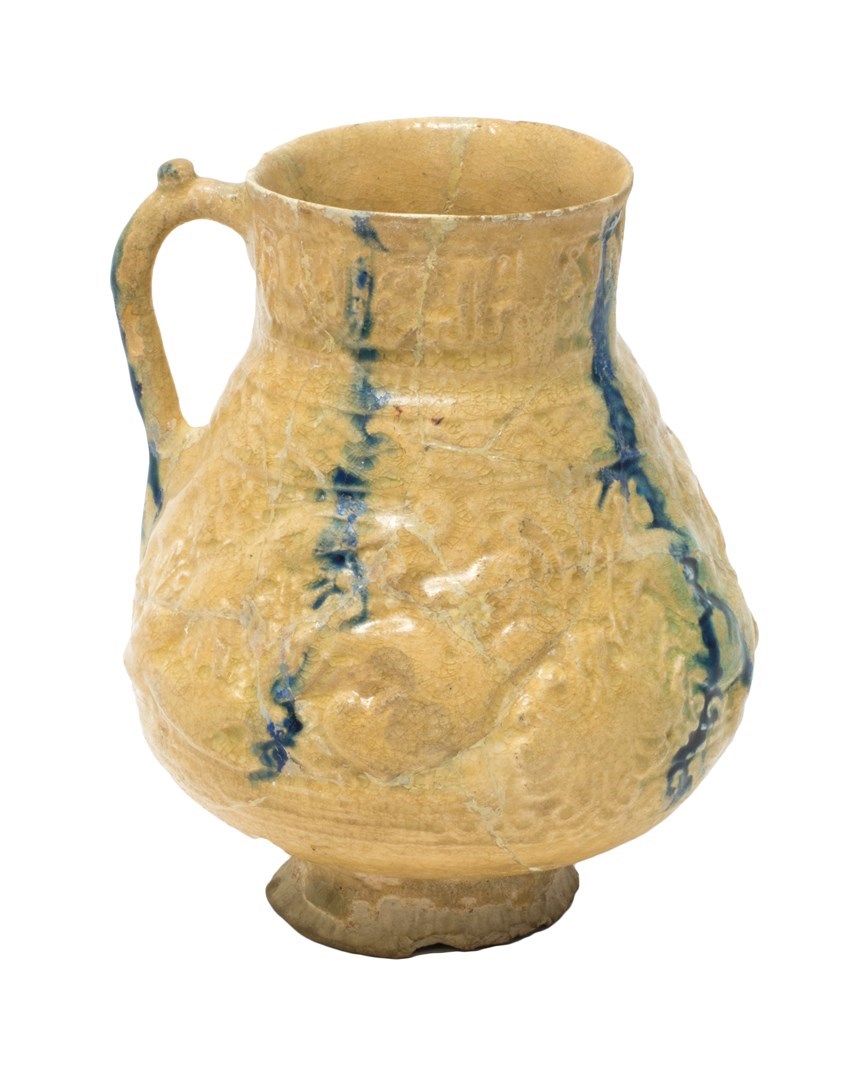 Appraisal: A Nishapur moulded and pierced pottery jug North East Iran