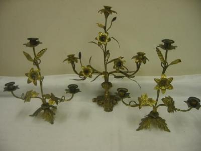 Appraisal: A THREE LIGHT GILT METAL CANDELABRUM modelled as a flowering