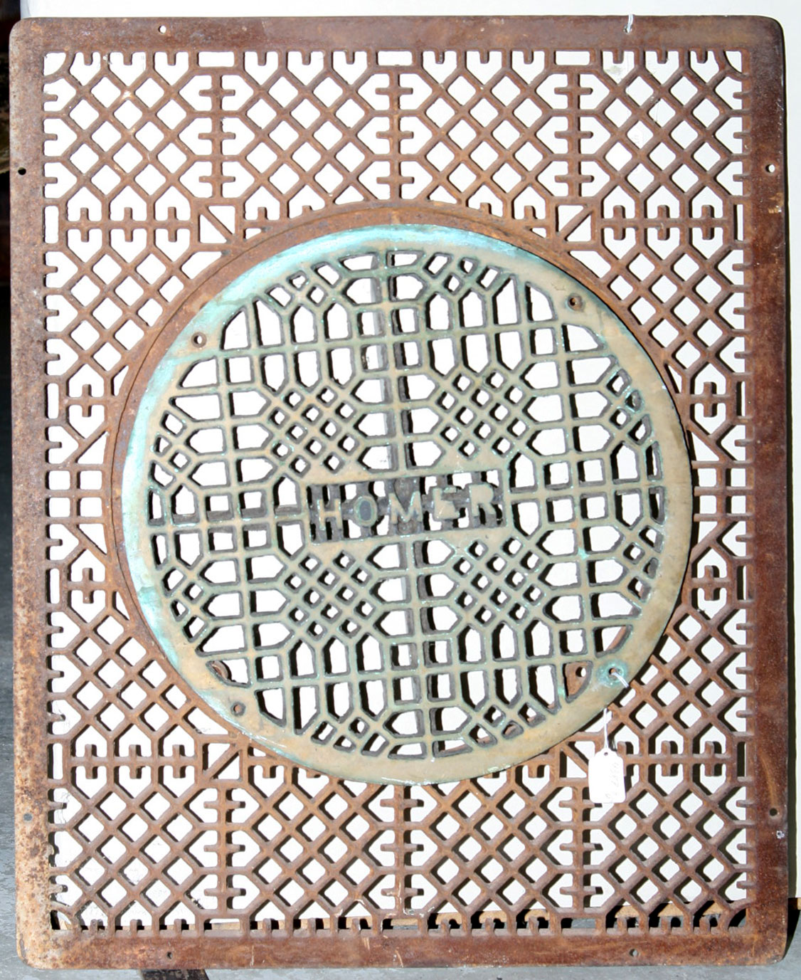 Appraisal: HOMER CAST-IRON TWO-PART FLOOR GRATE Overall x inches diameter of