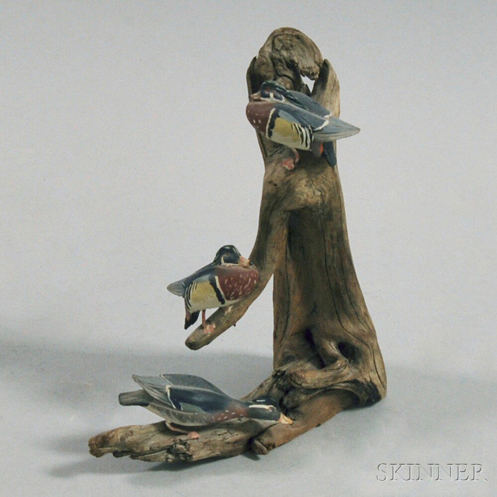 Appraisal: Miniature Carved and Painted Duck Figural Group stamped on underside