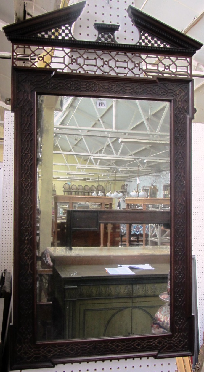 Appraisal: A late th century mahogany wall mirror of Chippendale design