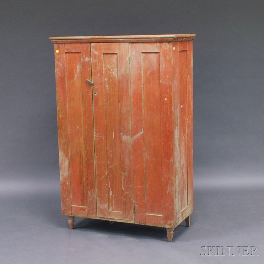 Appraisal: Red-stained Country Pine Cupboard late th century with paneled sides