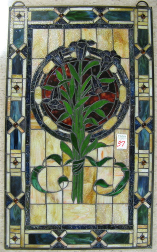 Appraisal: A STAINED AND LEADED GLASS WINDOW PANEL having a vivid