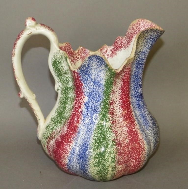 Appraisal: RAINBOW SPATTER PATTERN CREAMER PITCHERca three color Rainbow pattern spatter